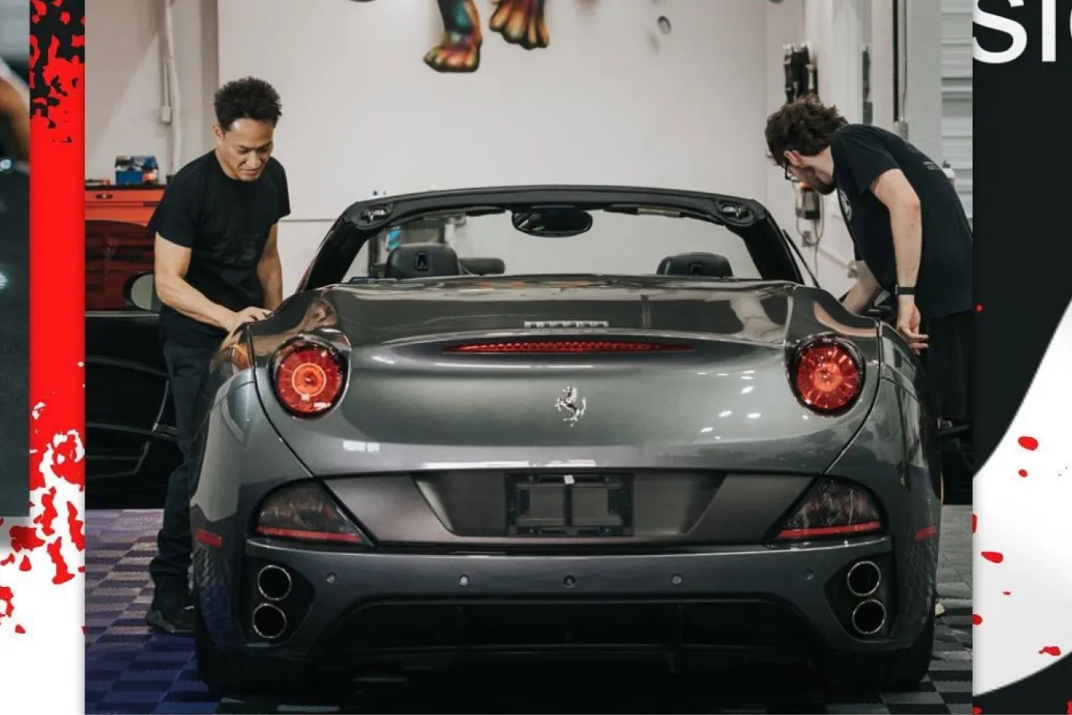 Rear view of a Ferrari receiving windshield protection film installation.